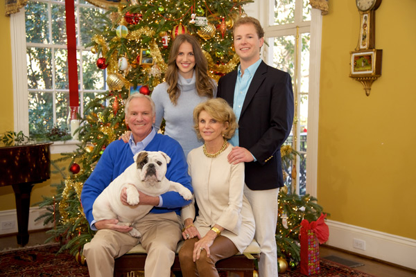 The Governor's Family in front of a Christmas tree